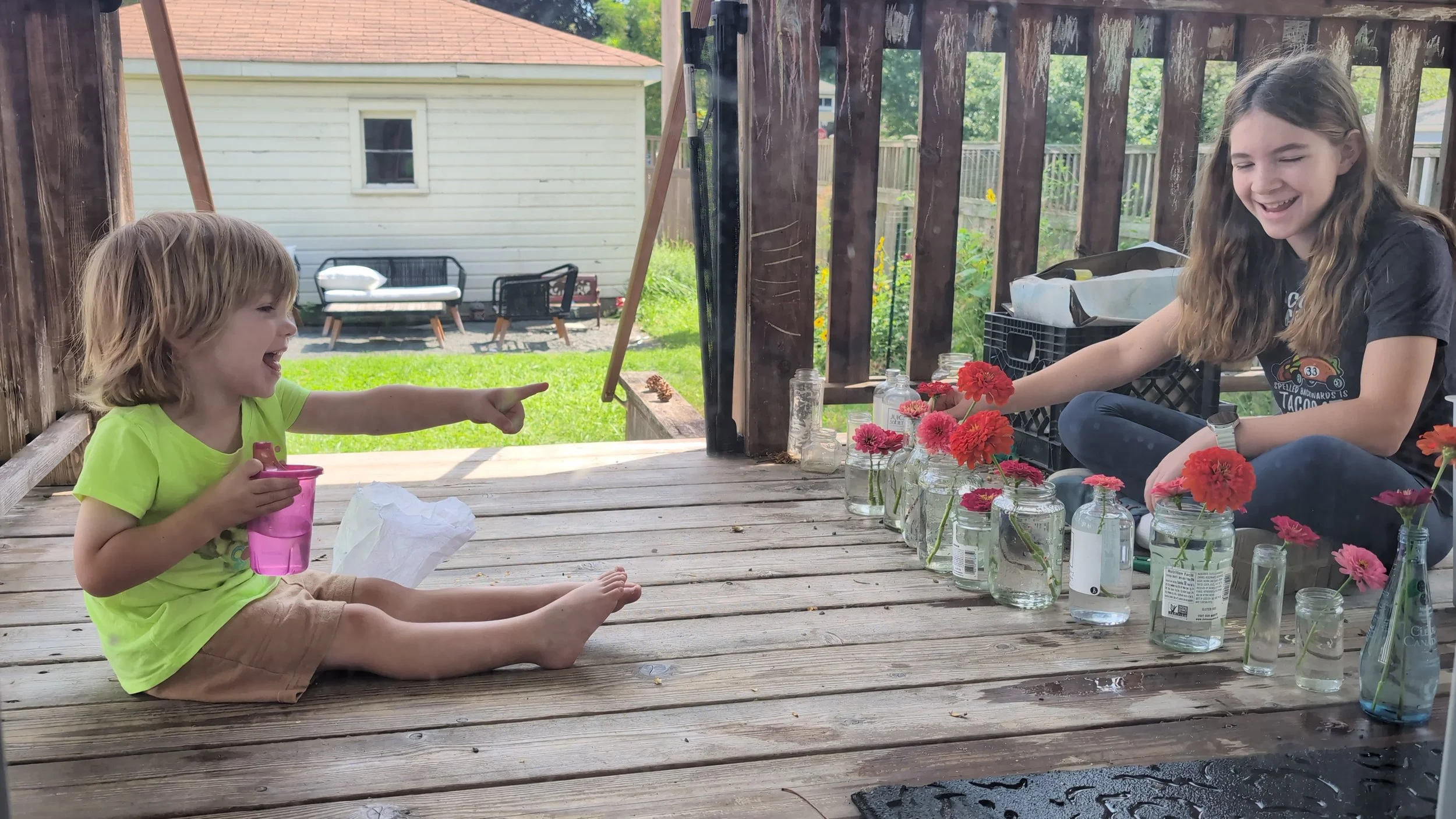 My little brother helping me pick out flowers!