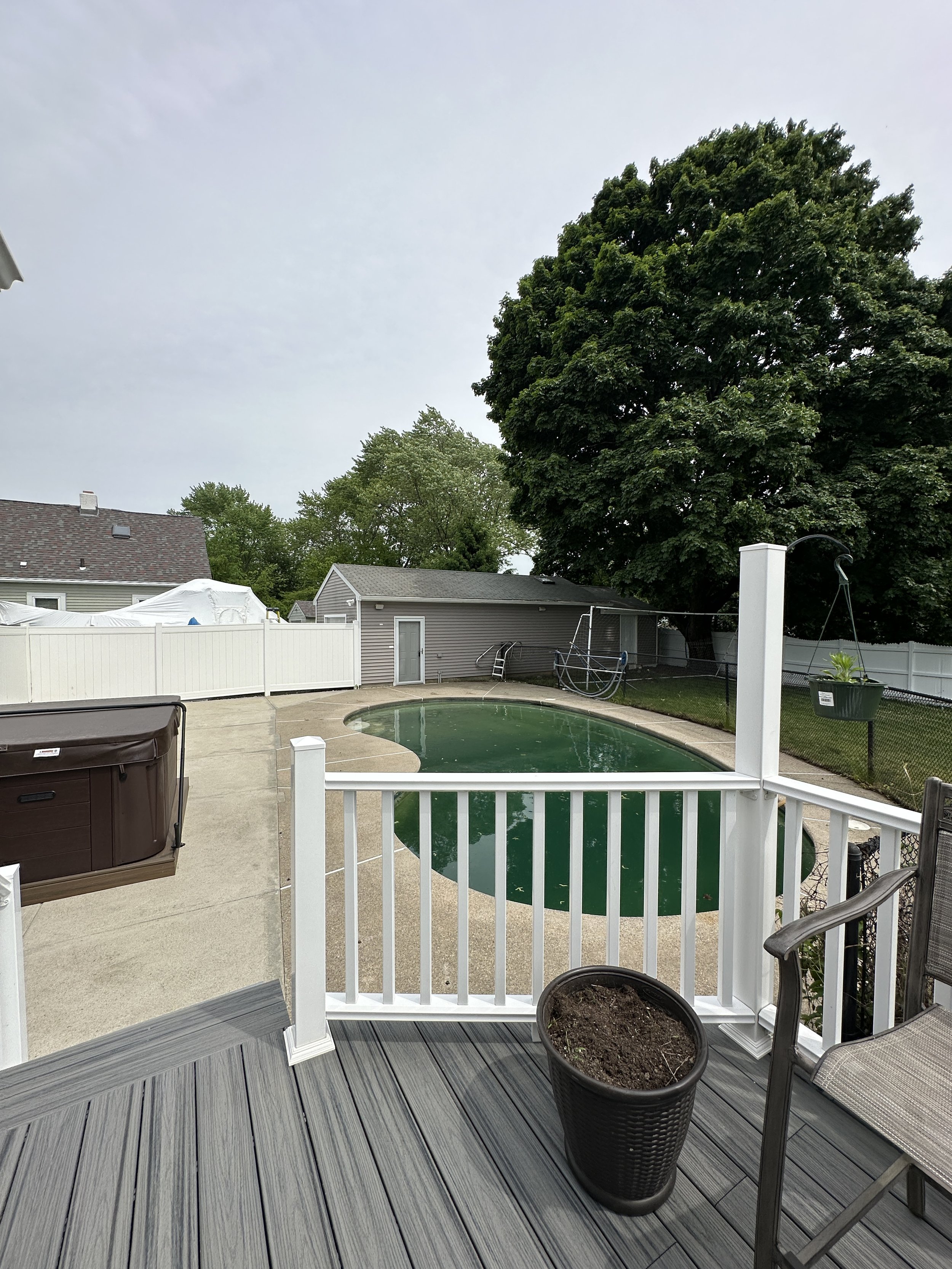 AFTER - Roof cleaned! Fences cleaned! Concrete cleaned and sealed! 