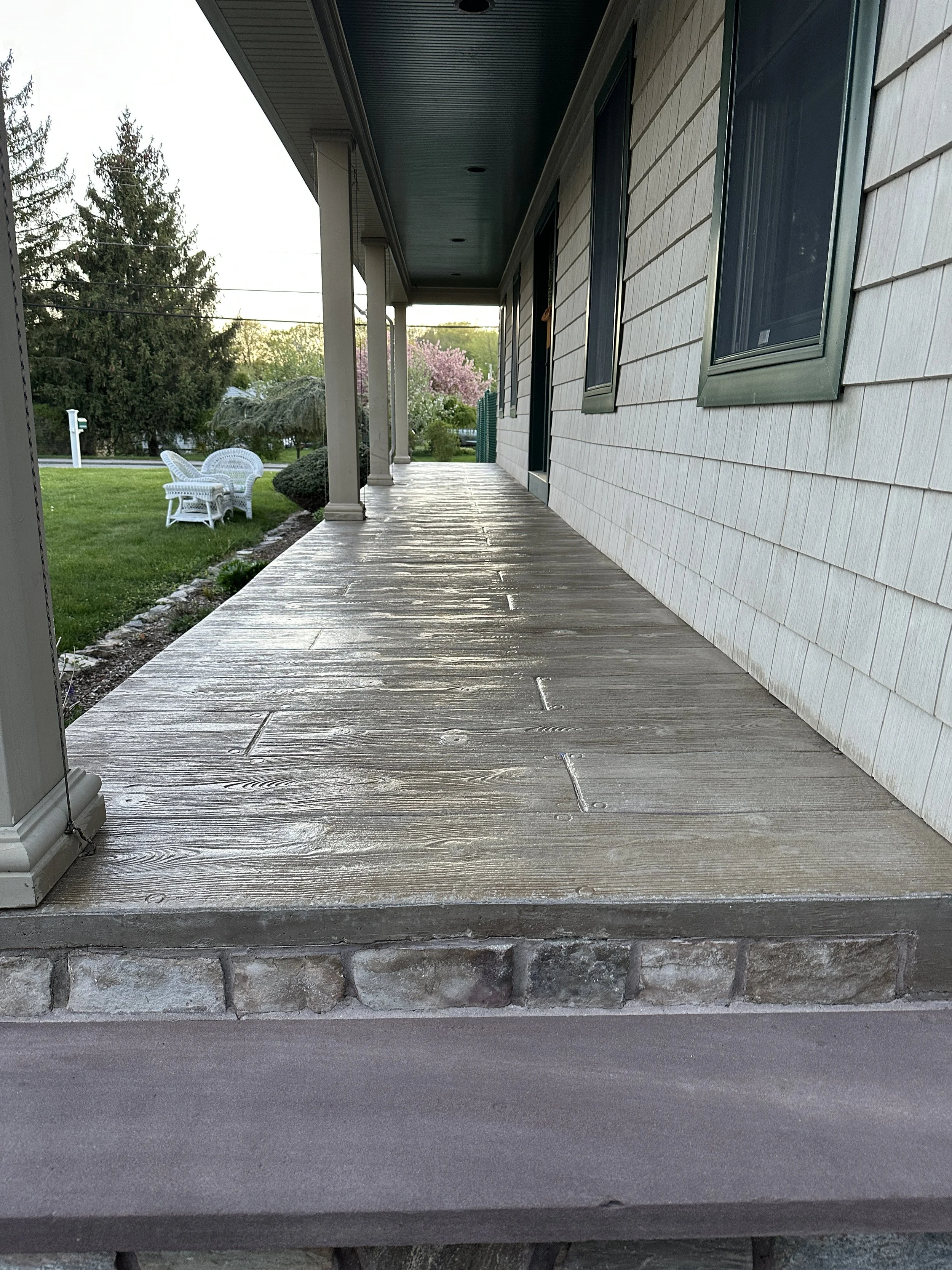 AFTER - Stamped concrete patio cleaned and sealed! Stone steps also cleaned! Came out fantastic!