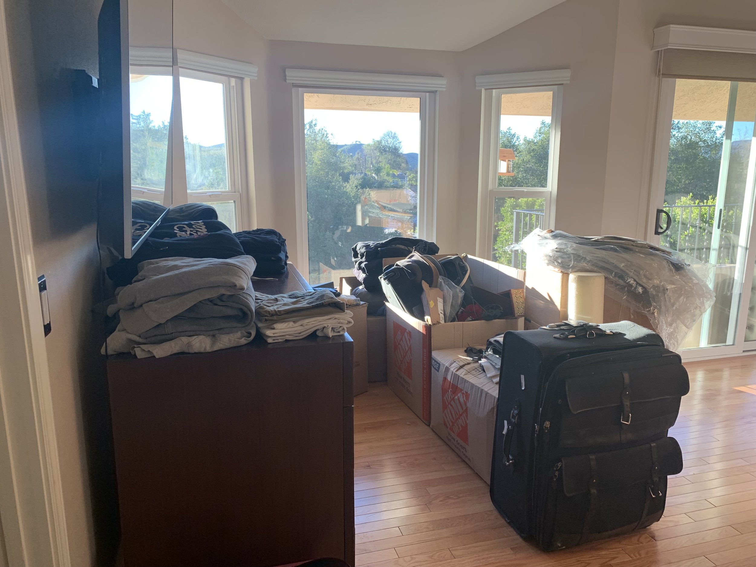 Oak Park Before - Needed help getting unpacked in main bedroom