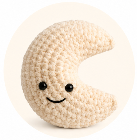 Luna Moon, a soft crocheted crescent moon character with a smiling face.