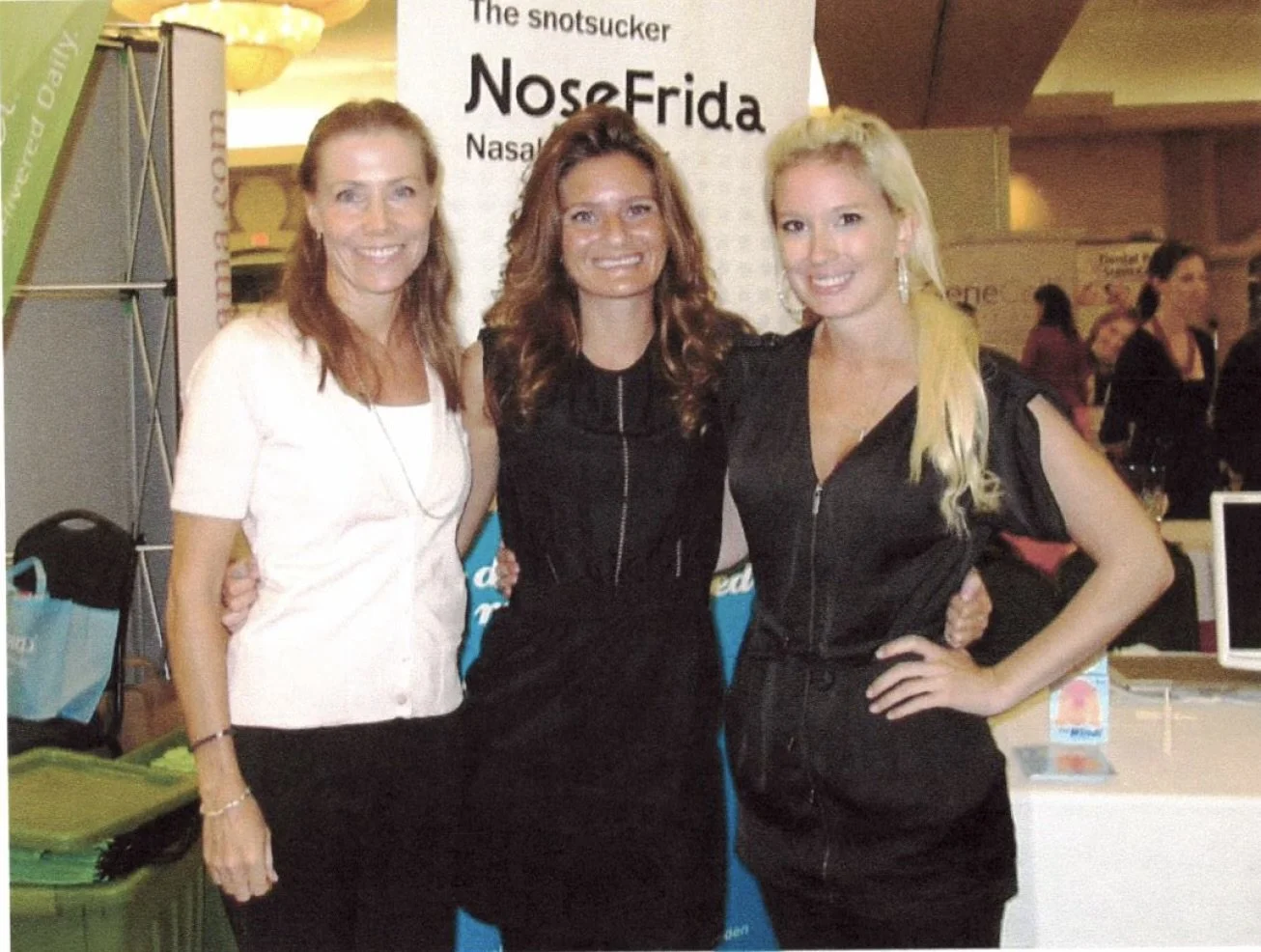 Fridababy founder Kaisa Levine, COO Sarah Perilli, and a team member at a trade show, circa 2012