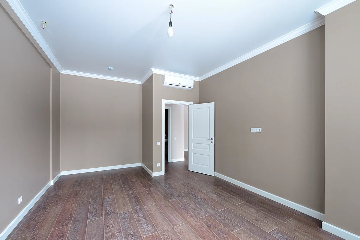freshly-painted-interior-light-brown.webp