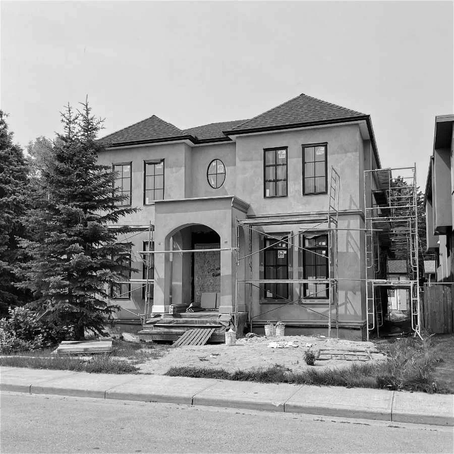 A house under construction, exterior view.