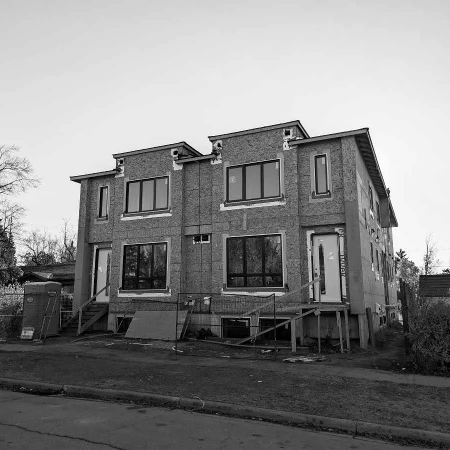 A house under construction, exterior view.