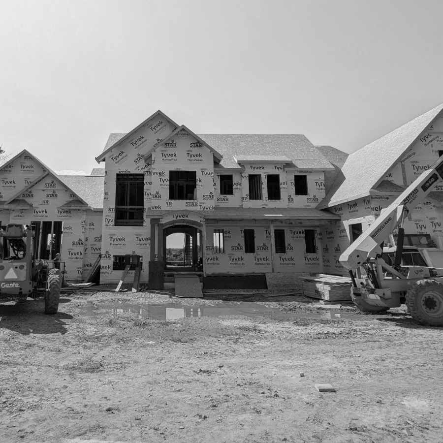 A house under construction, exterior view.