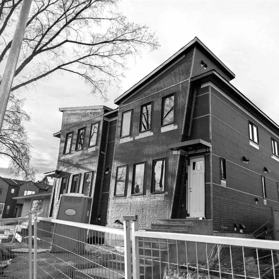 A house under construction, exterior view.