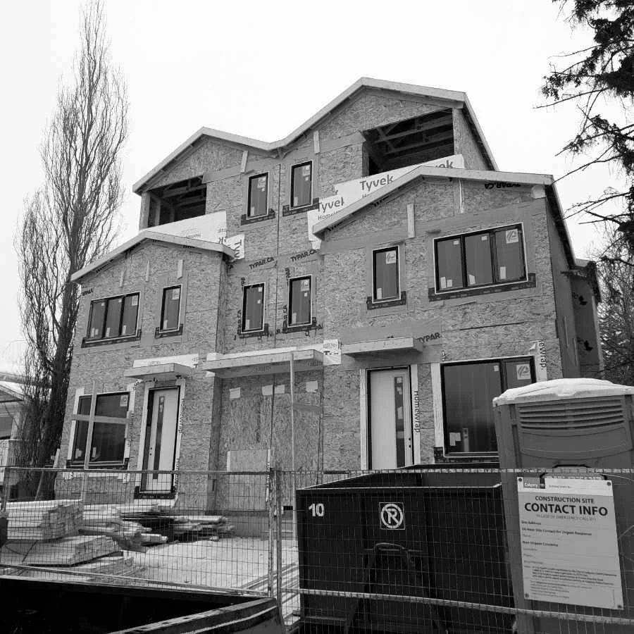 A house under construction, exterior view.