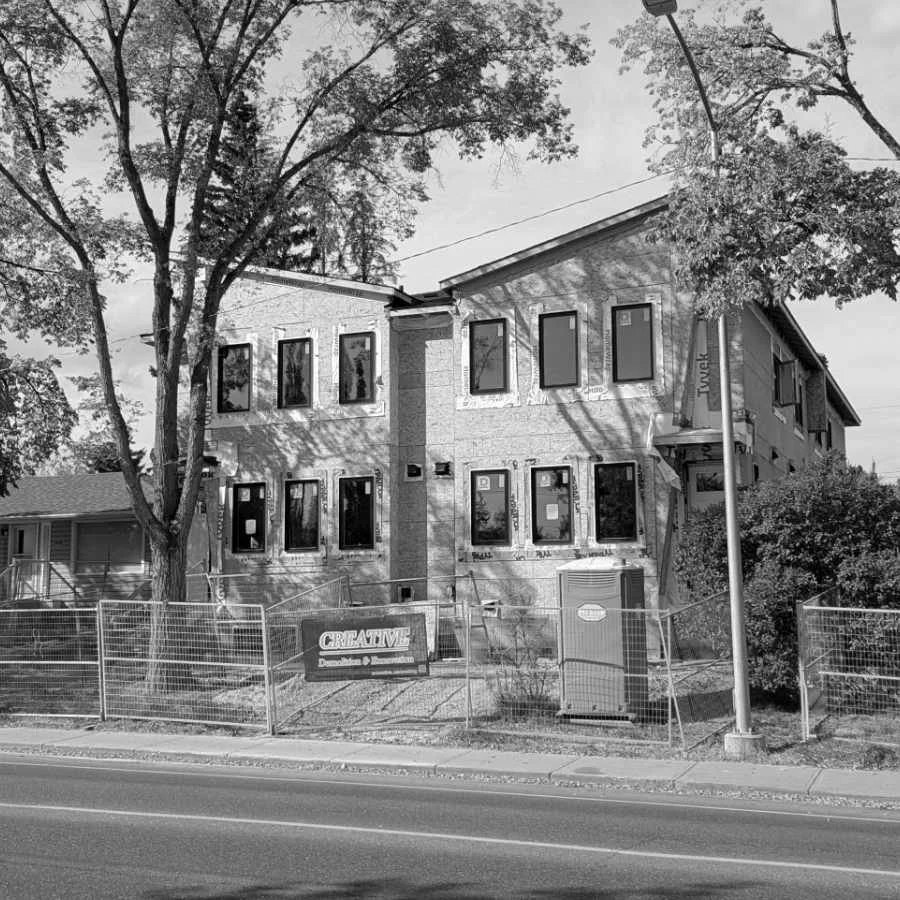 A house under construction, exterior view.