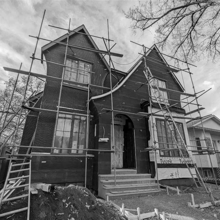 A house under construction, exterior view.