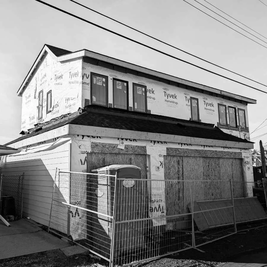 A house under construction, exterior view.