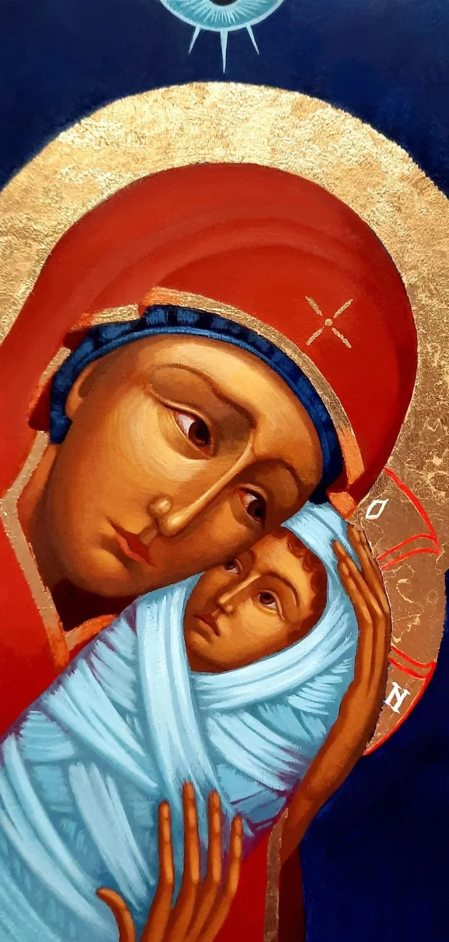The Nativity of Our Lord Jesus Christ.
4 x 8 x 0.25 inches (10 x 20 x 2cm), acrylic paint and golden metal leaf on wood panel, 2021 and 2022 (two identical versions were hand-painted). Privately commissioned icons.
