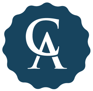 A dark blue circular badge with a stylized omega symbol and a stylized letter A inside the circle.