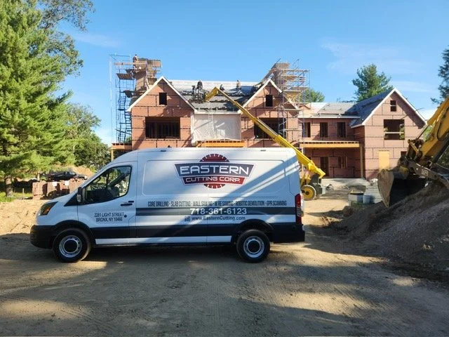 Eastern van in front of residential concrete cutting job site