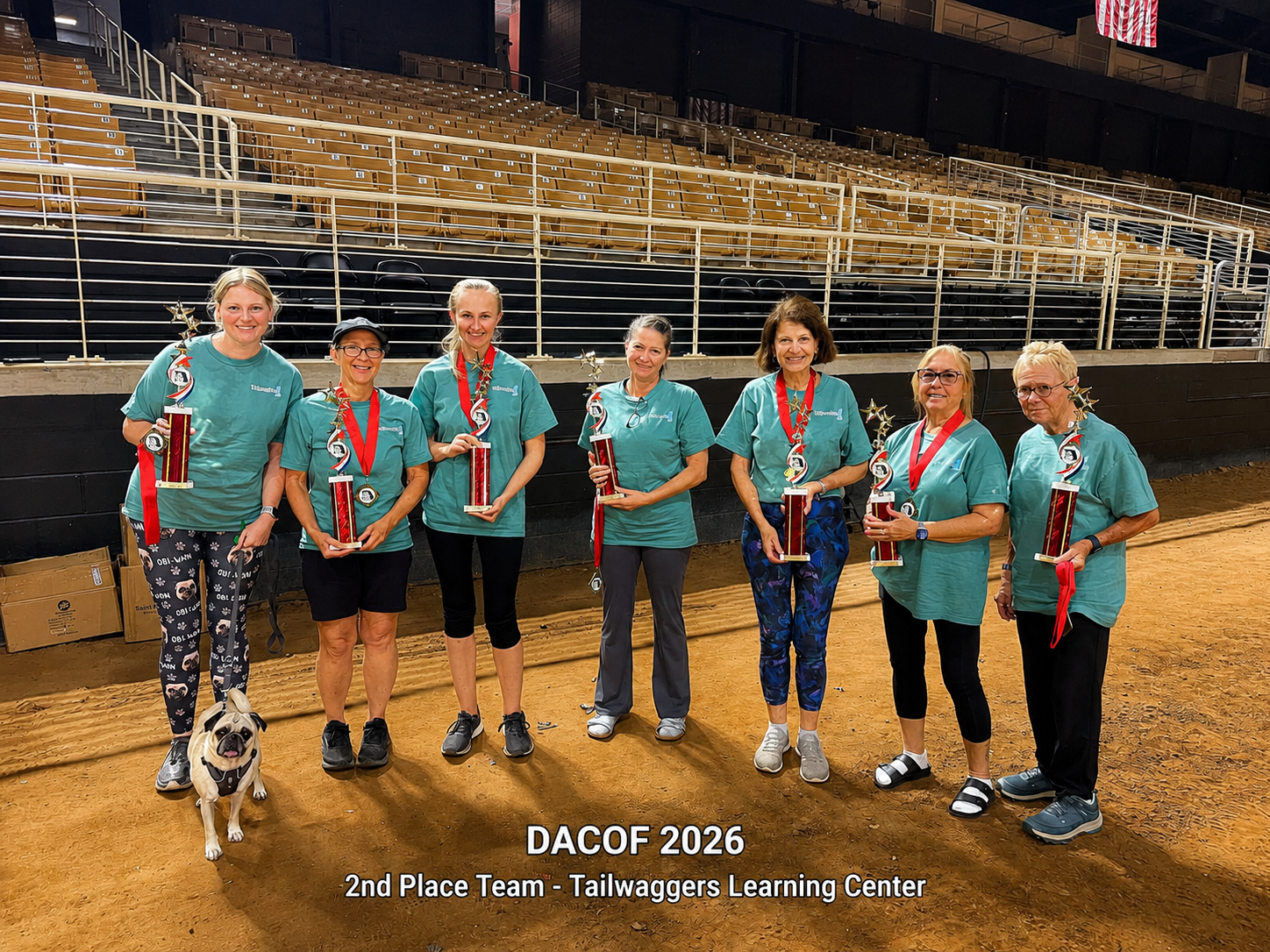 Tailwaggers Learning Center's 2026 DACOF second-place dog agility team posing with trophies after the Florida dog agility team competition.