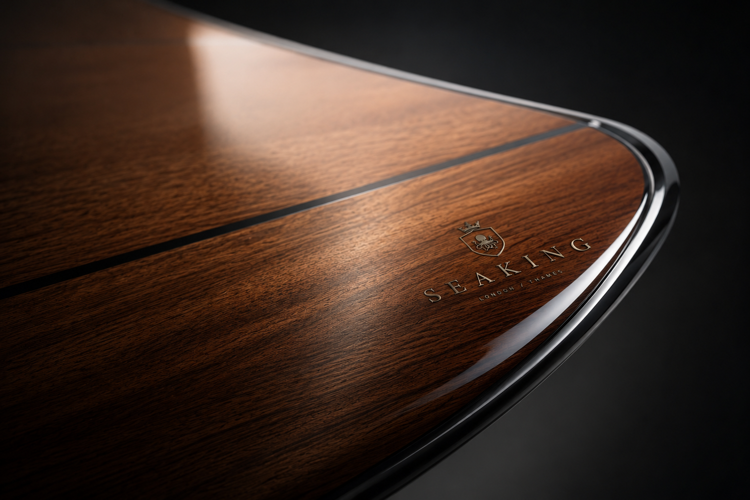 Close-up of a wooden chessboard with a glossy finish, featuring the Seaking logo with a lion and crown insignia, and the words 'Seaking London | Games' engraved on the surface.