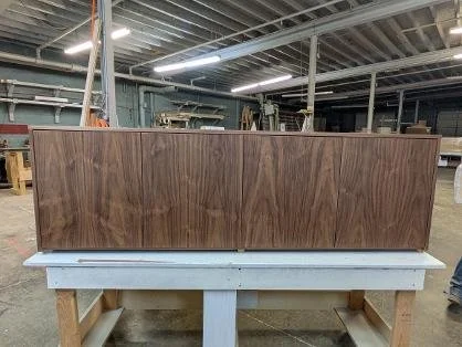 Walnut custom  cabinets. With clear  water based varnish top coat.