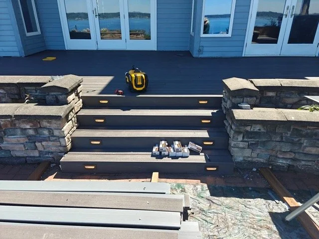 Outdoor stair lighting installation for improved safety and visibility at a residential property.