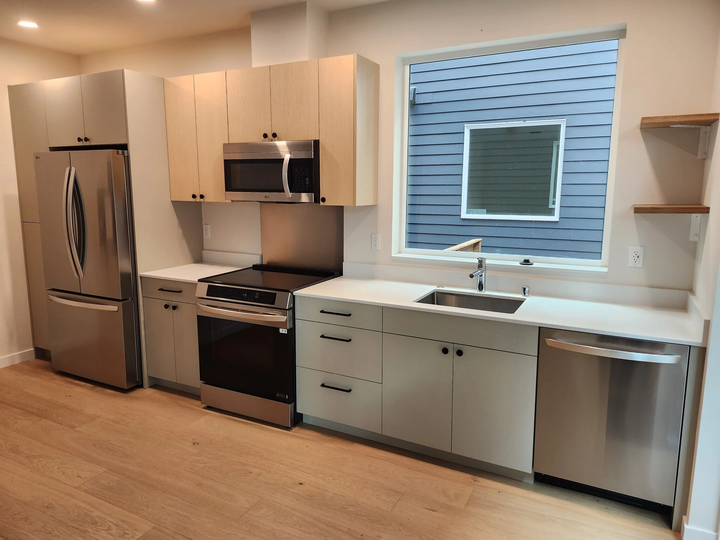 Electrical wiring for kitchen appliances and lighting in a newly constructed townhome