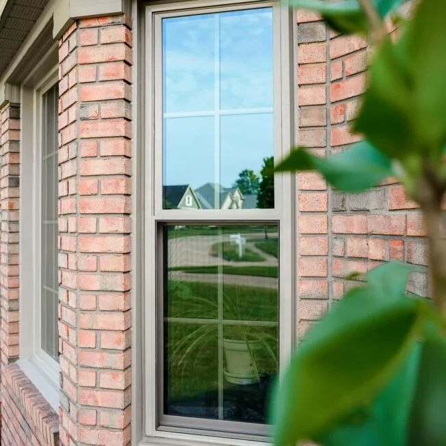 Aeris-double-hung-in-Sandstone-with-Colonial-Grids_DSC8221webEDIT-652x652.jpg