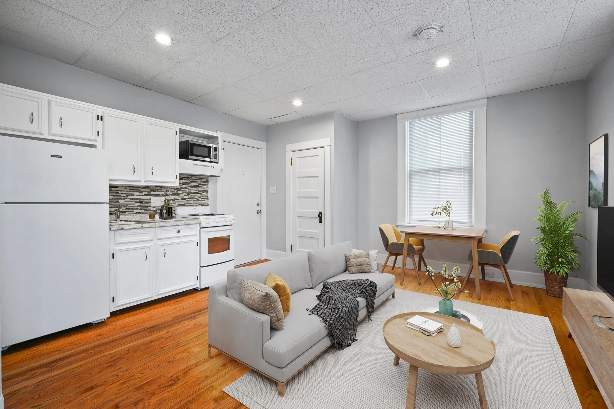 Living RoomDining Area Virtually Staged.jpg