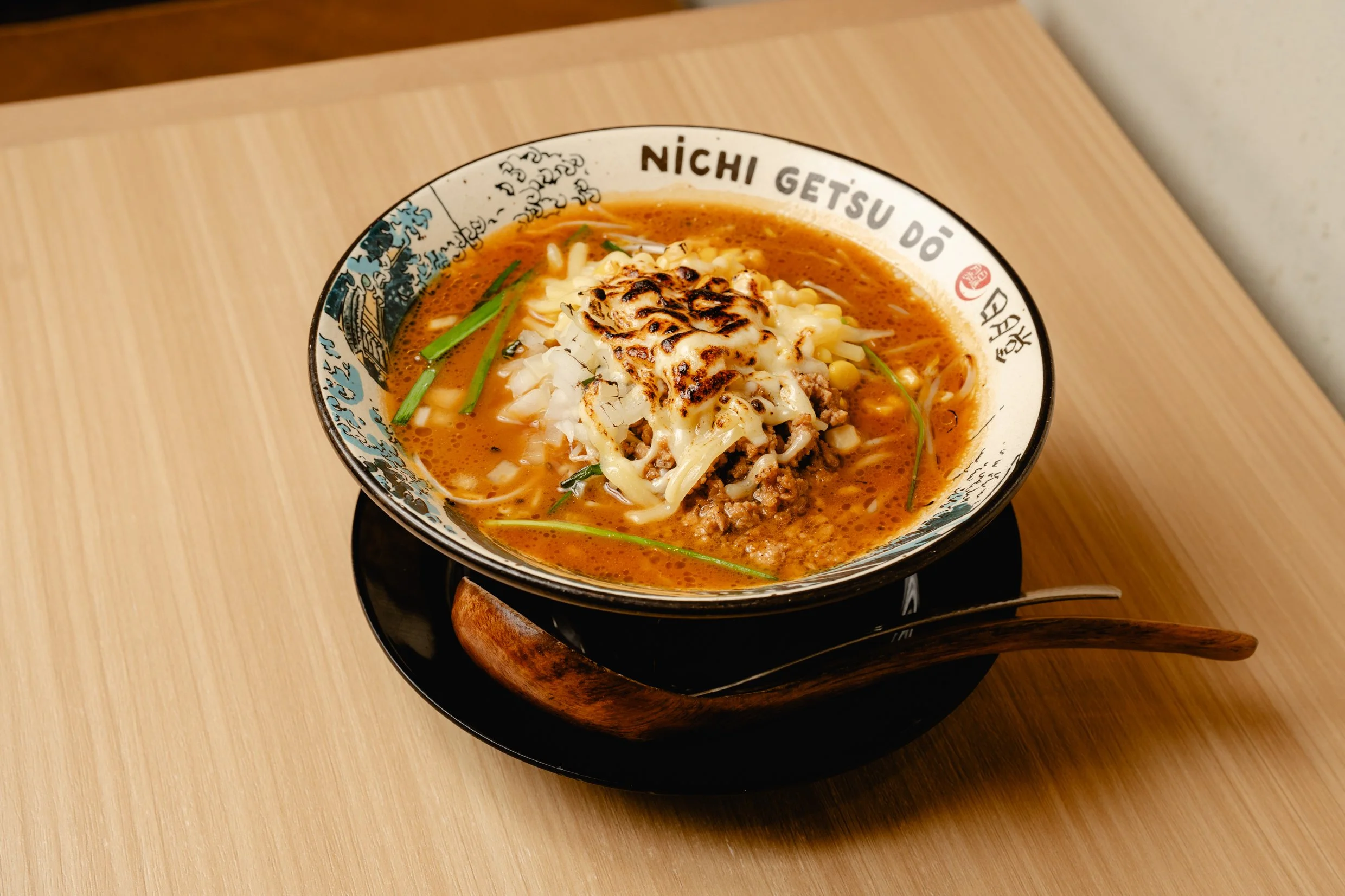 Miso Ramen topped with grilled cheese