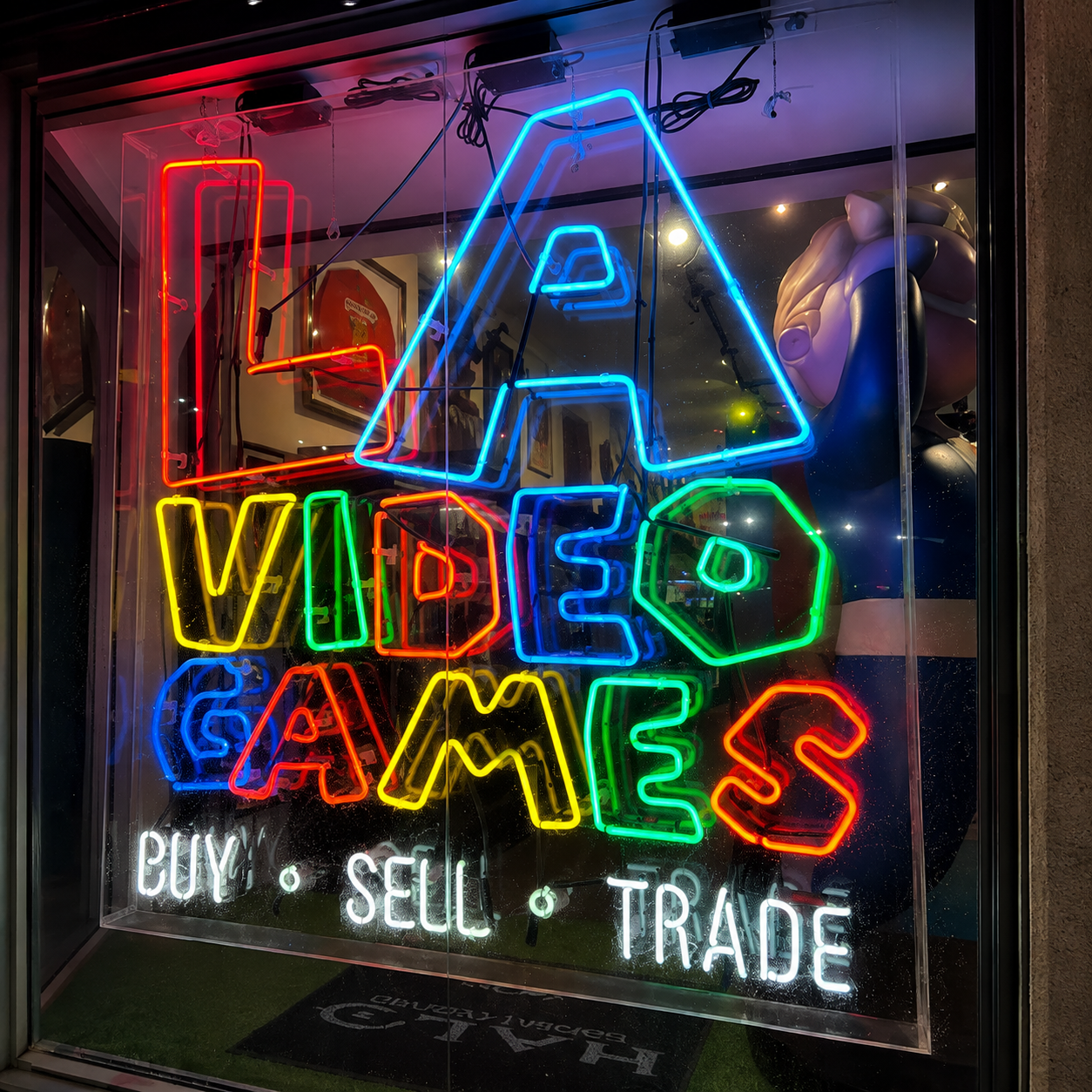 LA Video Games storefront with colorful neon sign on Melrose Avenue in Los Angeles