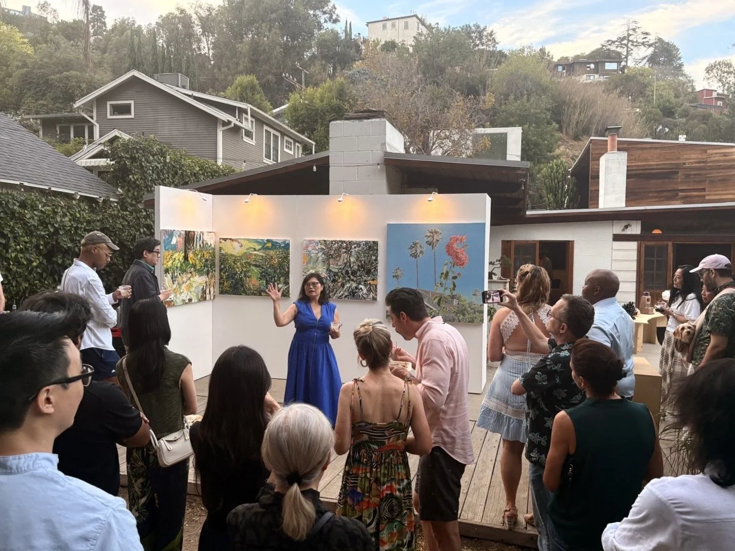 Sophia McCabe gives welcoming remarks and walkthrough of exhibition.