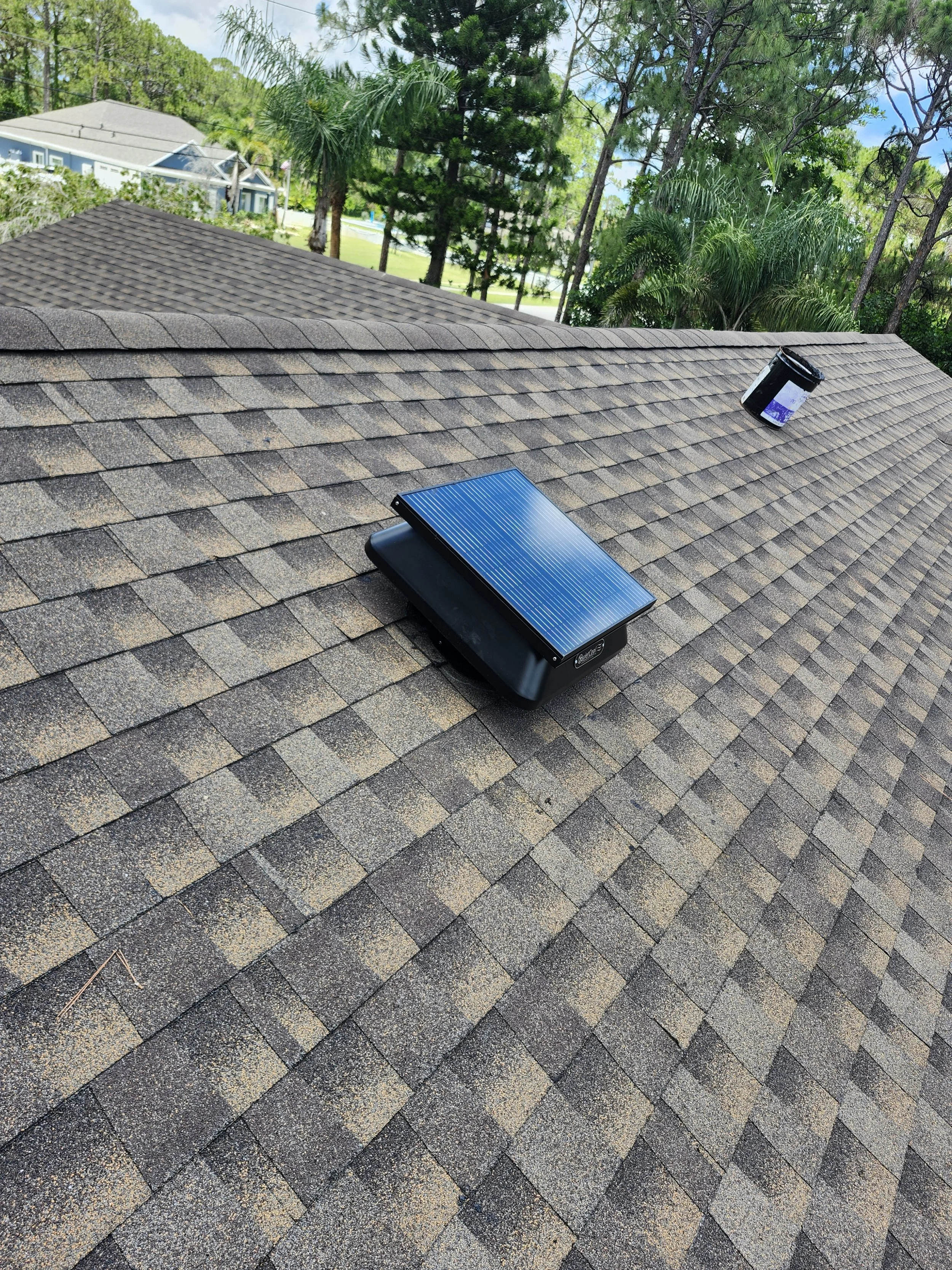 Solar Fan installed on a shingled roof for ventilation