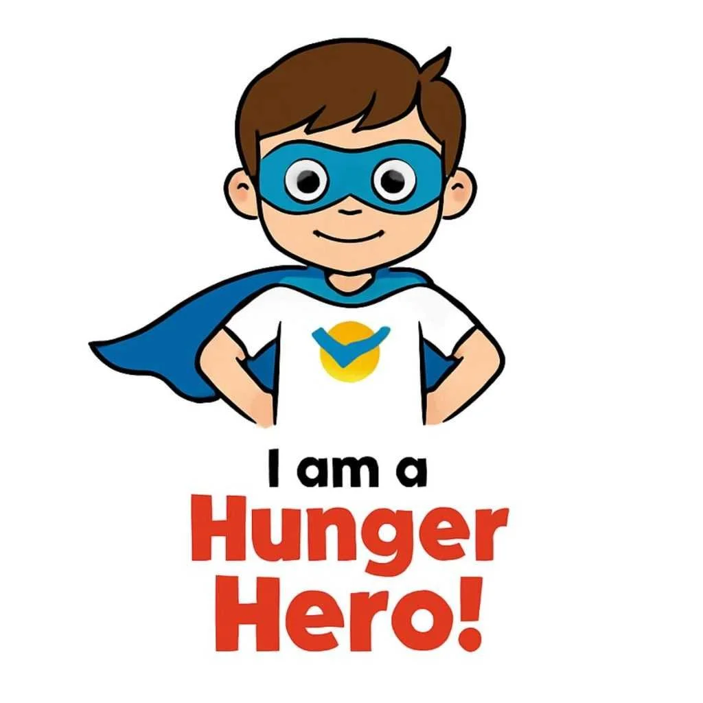 A cartoon boy dressed as a superhero with a blue mask and cape, wearing a white t-shirt with a yellow and blue logo. The text reads 'I am a Hunger Hero!' in black and red letters.