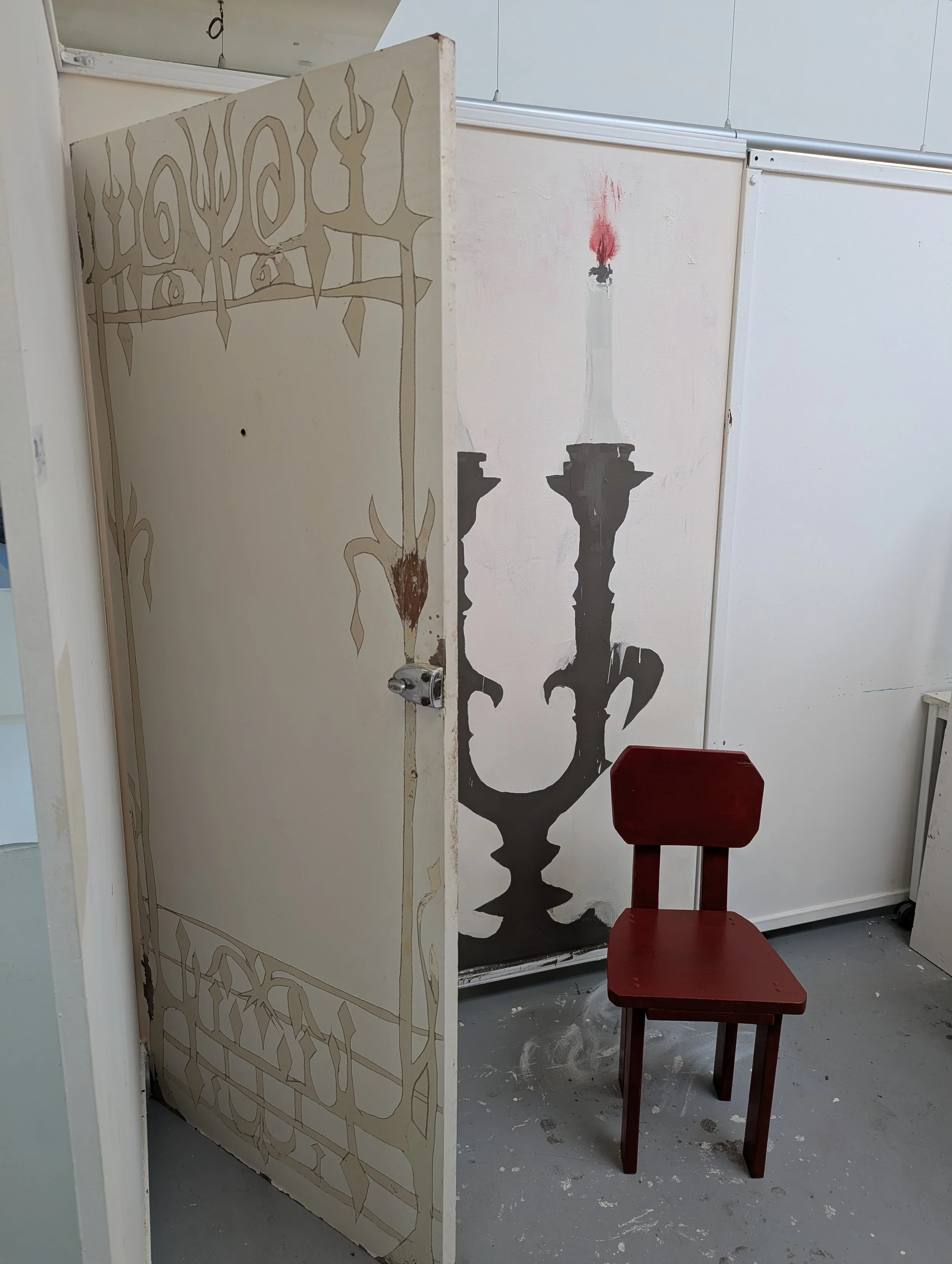Studio Installation - Featuring Hand painted mural, hand built chair, and hand carved door
