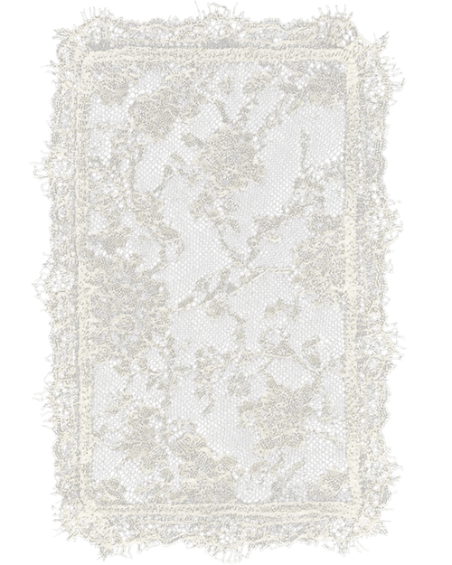 White lace doily with floral pattern and fringe edges.