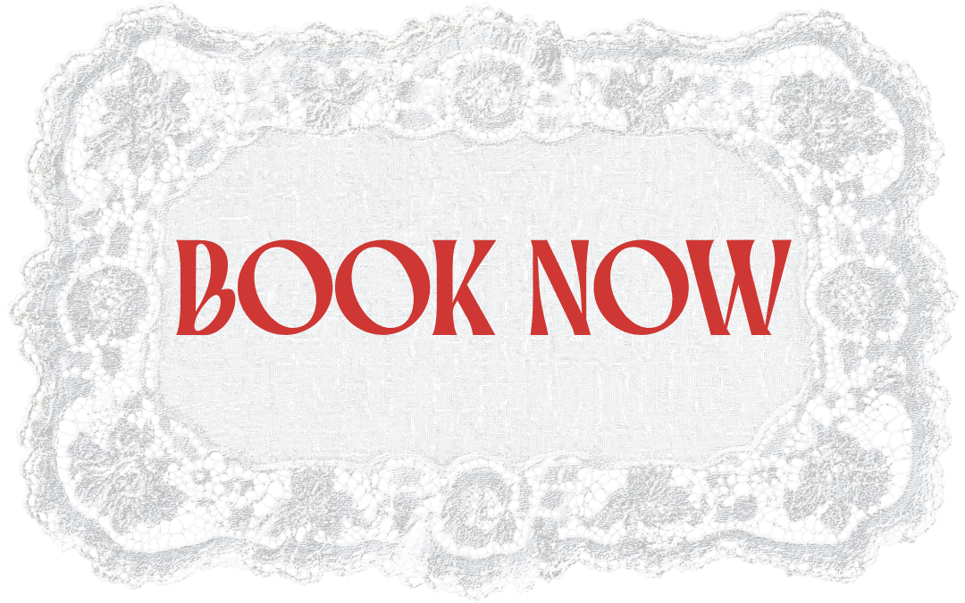 A lace doily with the words "BOOK NOW" in red text in the center.