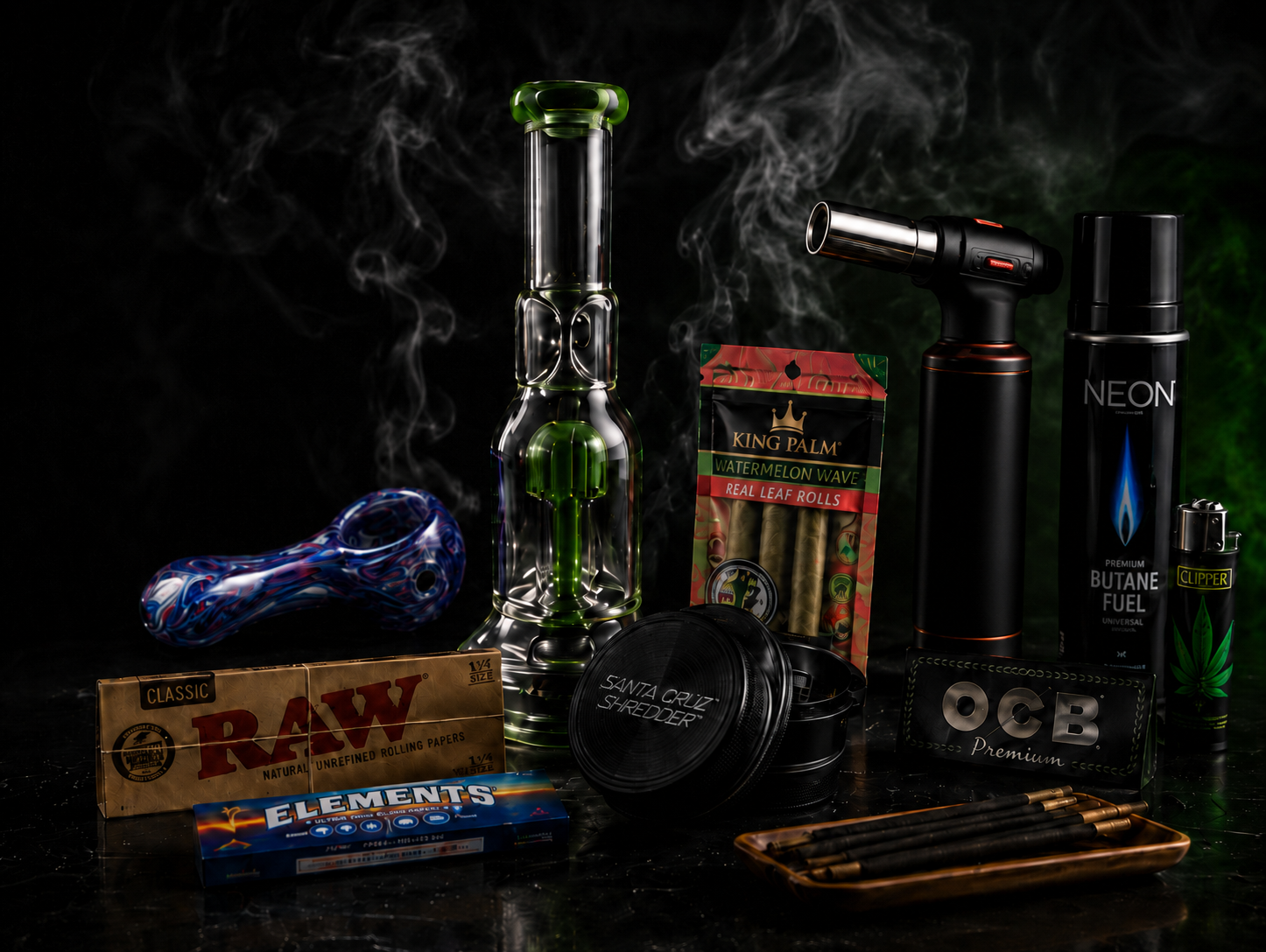 Smoking accessories at Cave Smoke Shop in Durham NC including glass water pipe, torch lighter, butane, rolling papers, wraps, grinder, incense and lighters