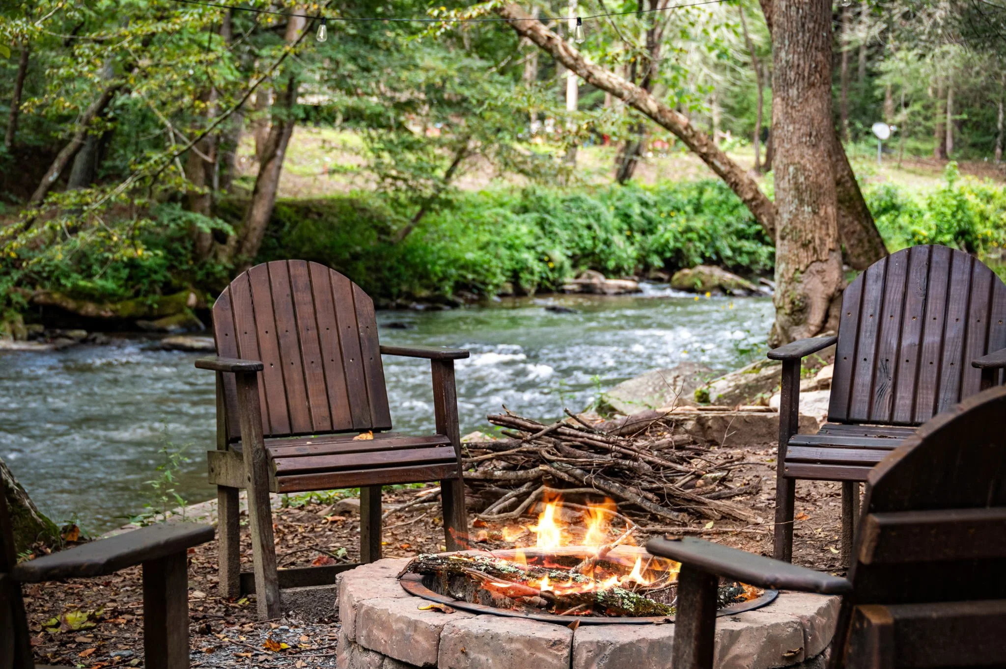Riverside fire pit at an Ellijay, GA cabin rental