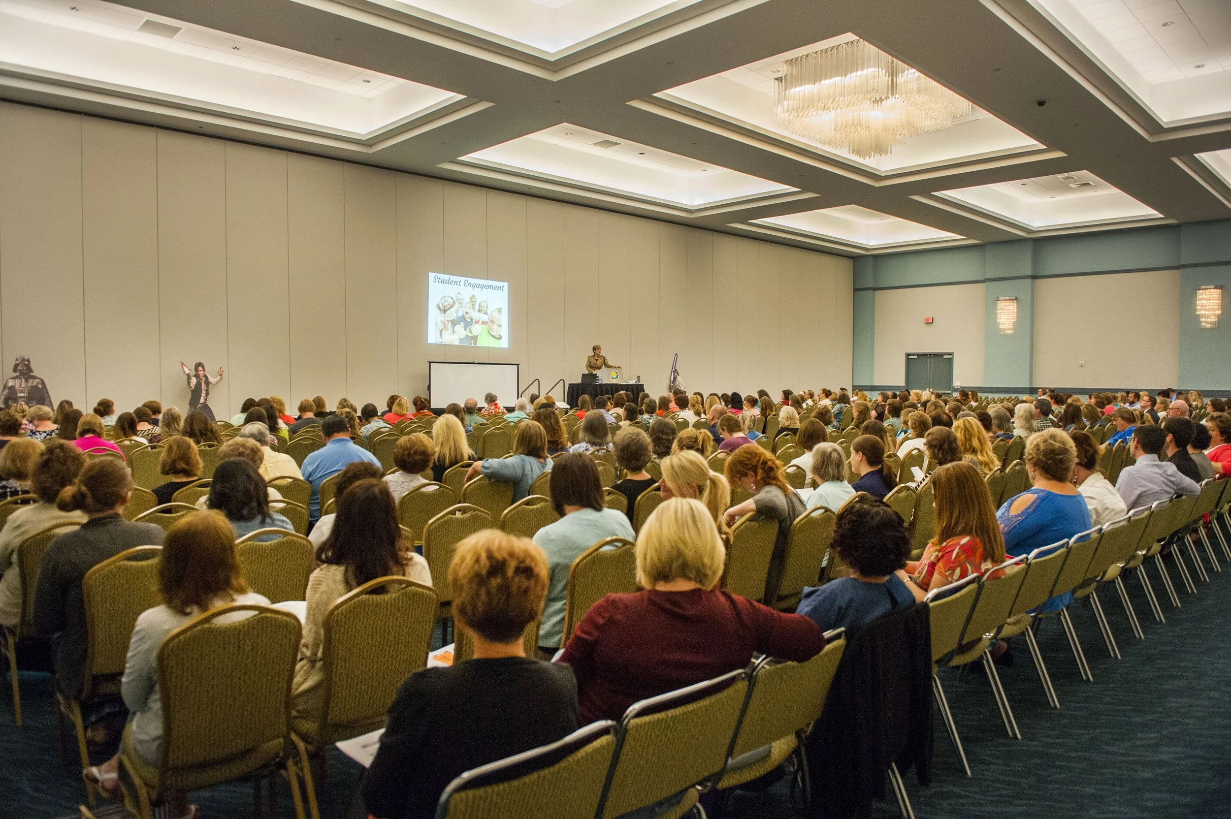 In-service training at teacher Convention 'Student Engagement' projected on the wall.