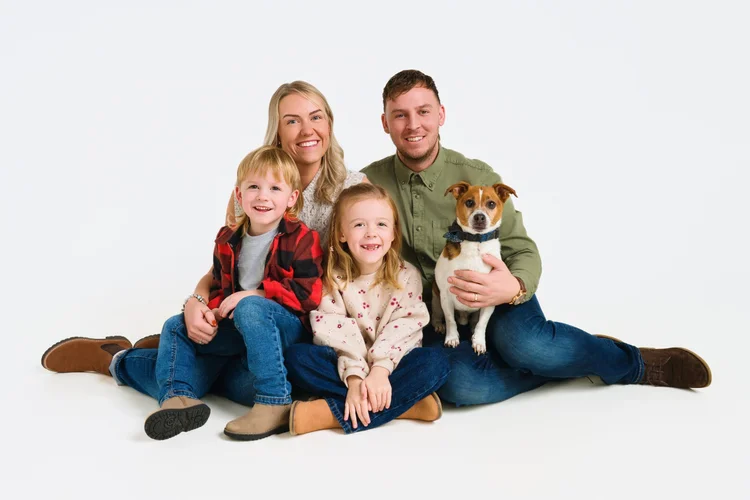 Family portrait with their dog