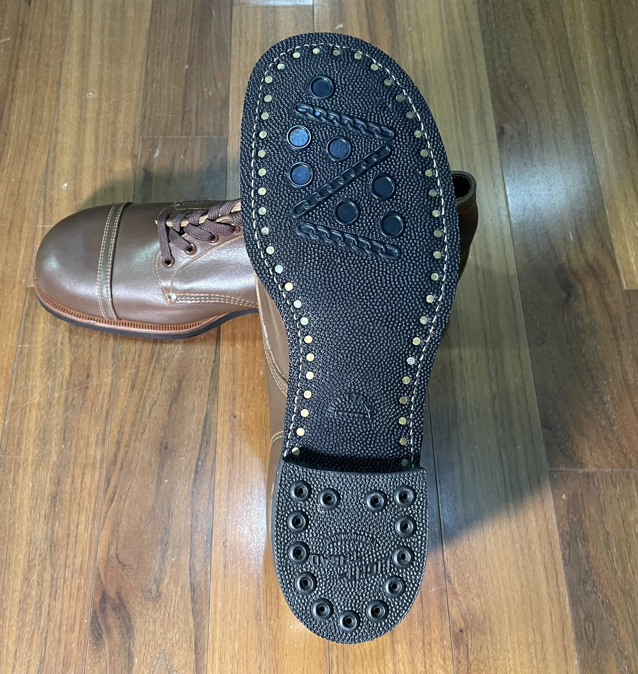 Outsole of the International Shoe Company Star Brand work boot, c. 1930s, showing the nailed sole construction, tread pattern, and heel arrangement.