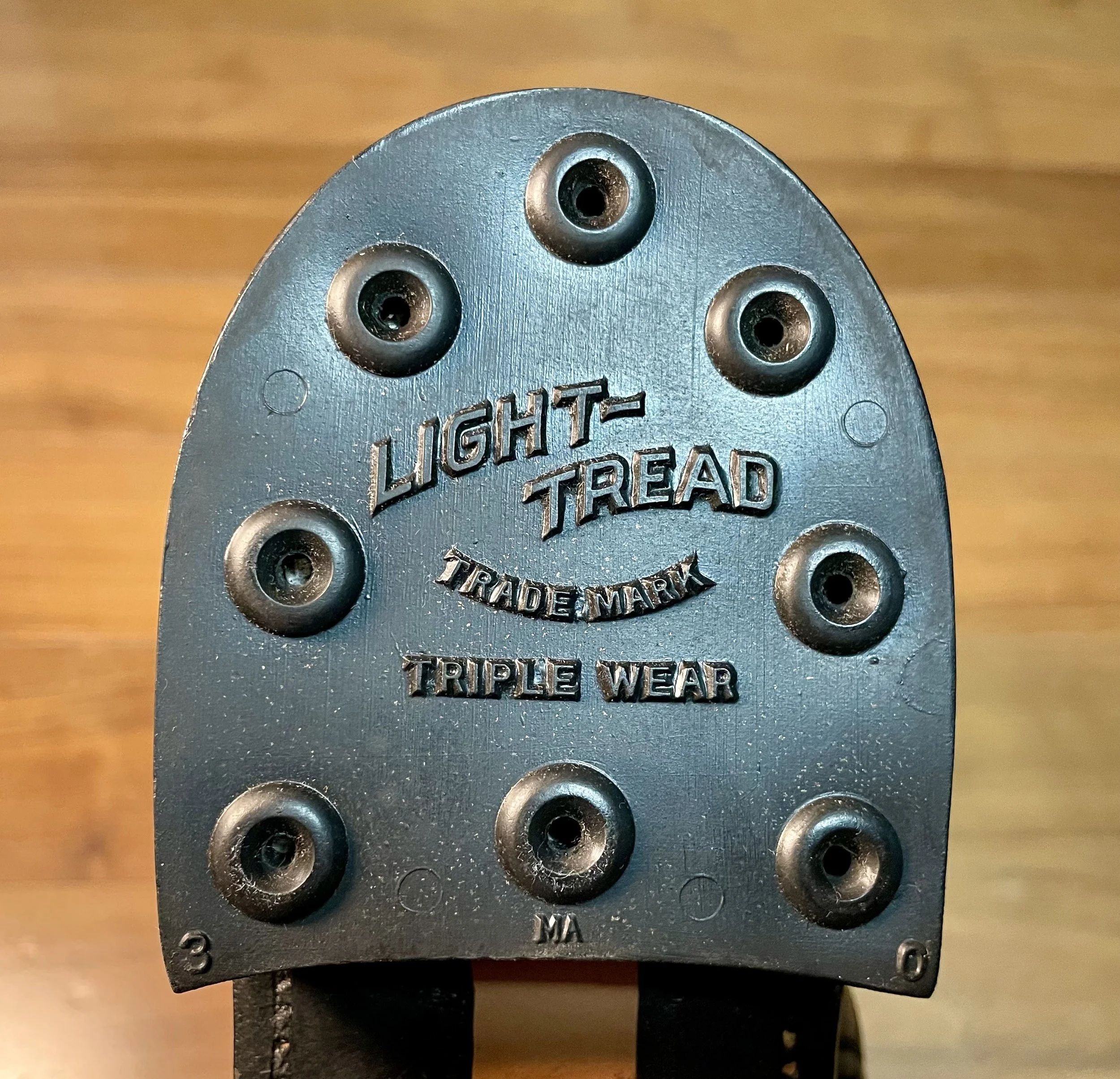 Heel detail of the Morse & Rogers Sundial Munson last boot, showing the branded rubber heel and nail layout.