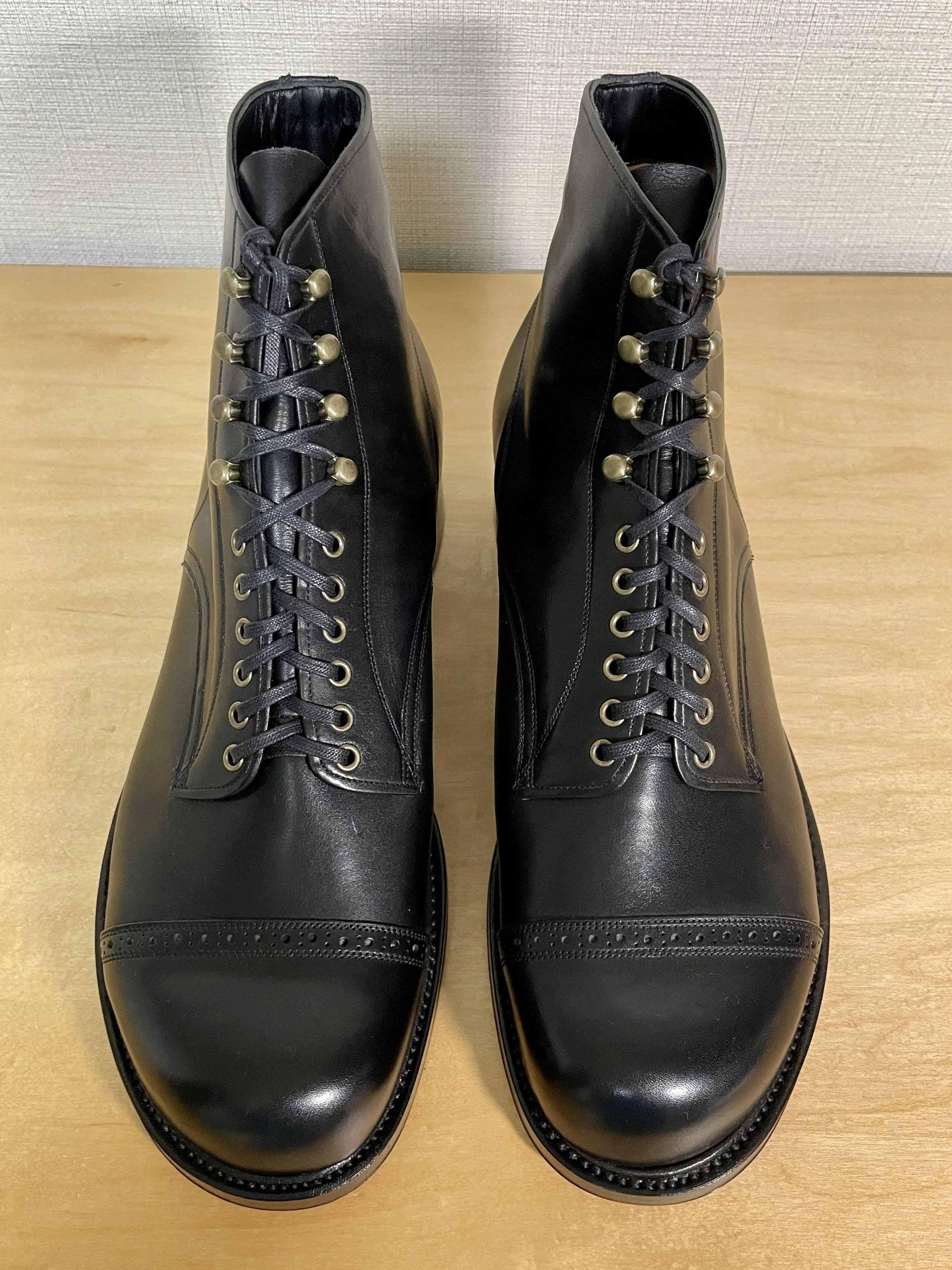 Rustroops Product No. 1 Prototype, shown from the front. This view highlights the cap-toe balance, lacing layout, upper proportions, and the restrained anatomical toe shape developed through the study of early American boots.