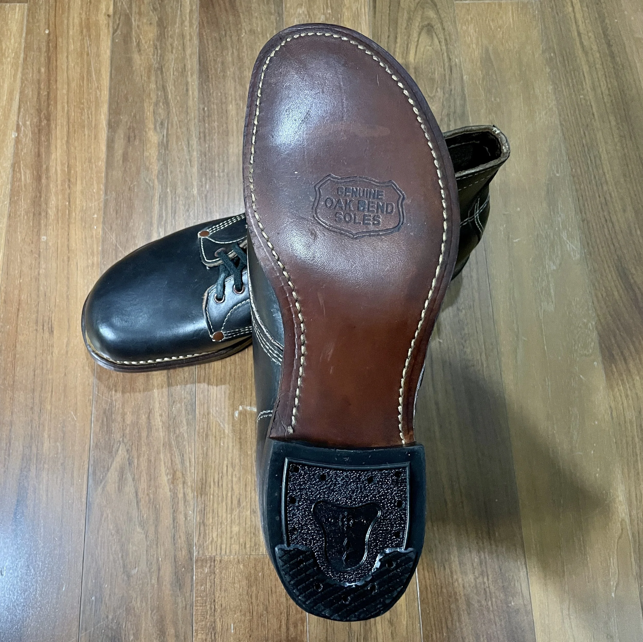 Leather outsole of the unknown maker work boot, showing the “Genuine Oak Bend Soles” marking, stitched sole edge, and practical heel construction.