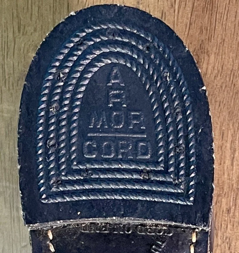 Armor Cord heel detail on the unknown maker work boot, showing the branded rubber heel and molded border pattern.