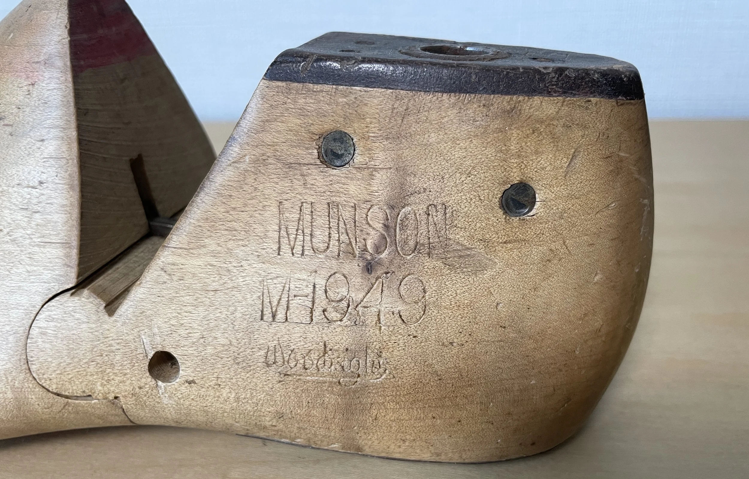 Munson M-1949 Daylight wooden shoe last, showing the stamped model marking and used as a reference for Rustroops last development.