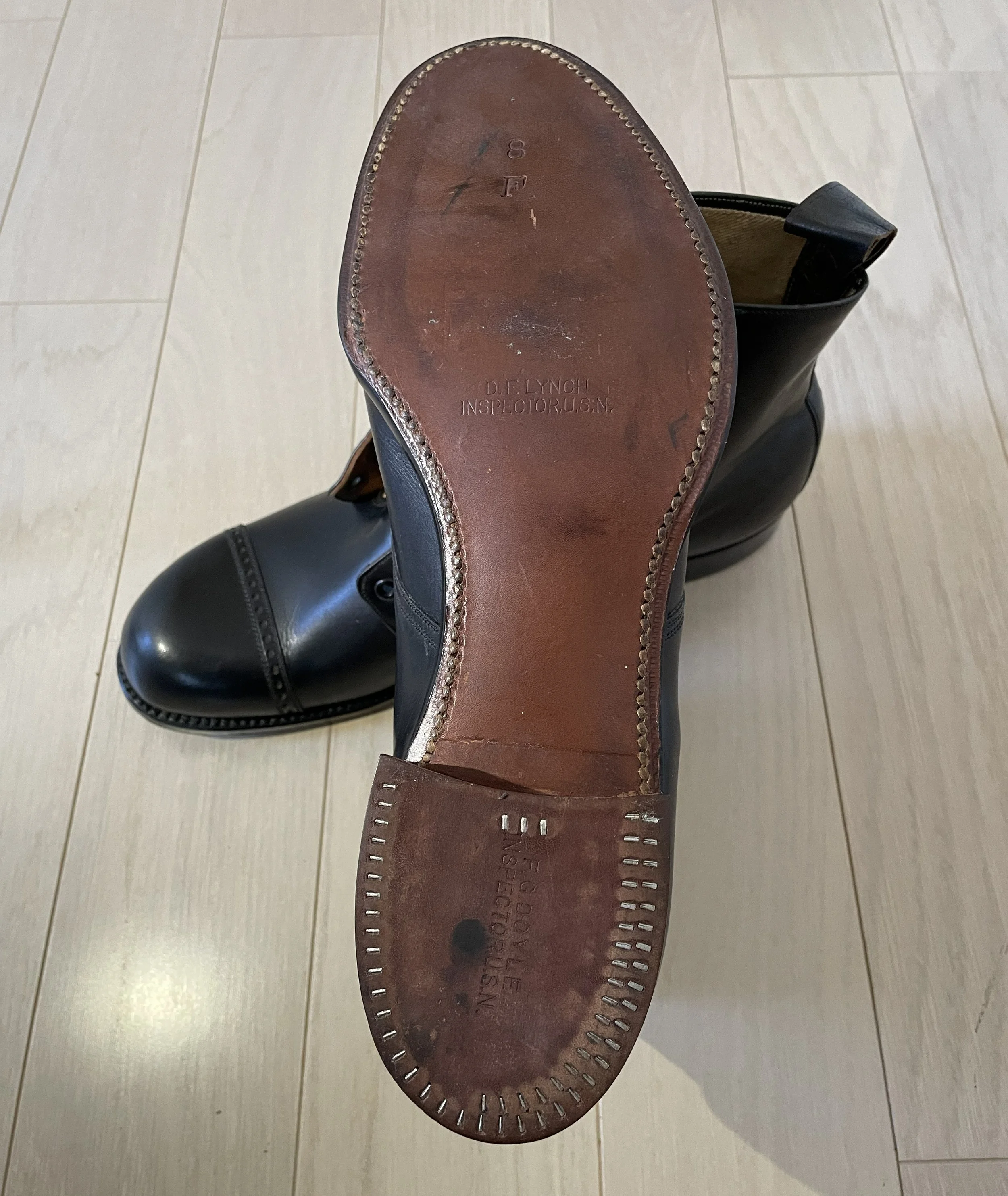 Outsole marking on the E. T. Wright U.S. Navy boot, preserving stamped production details from the original sole.