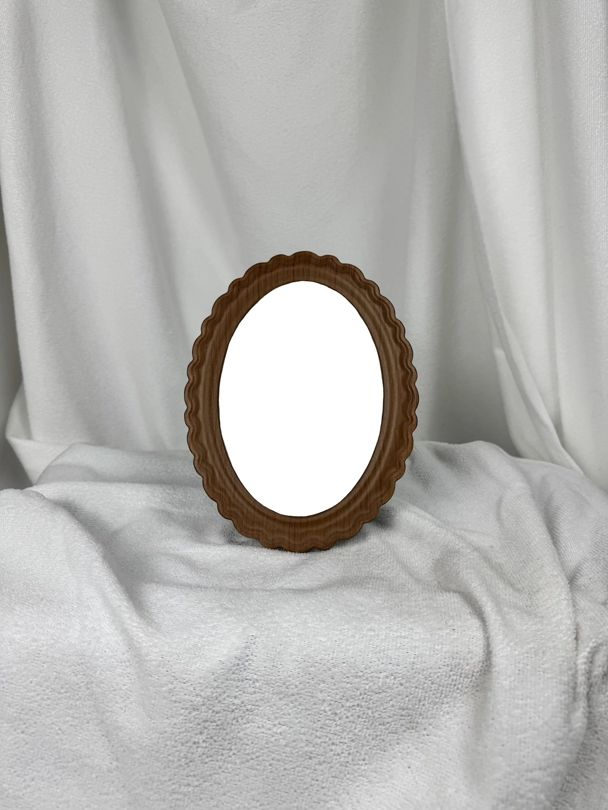 Oval frame
