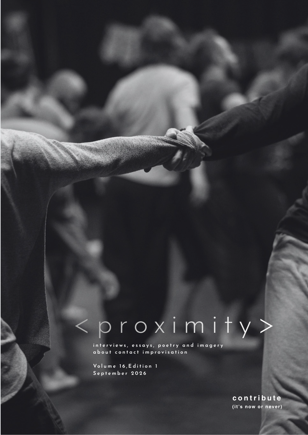 Black and white photo of two people holding hands in a handshake during an event, with other individuals in the blurred background.