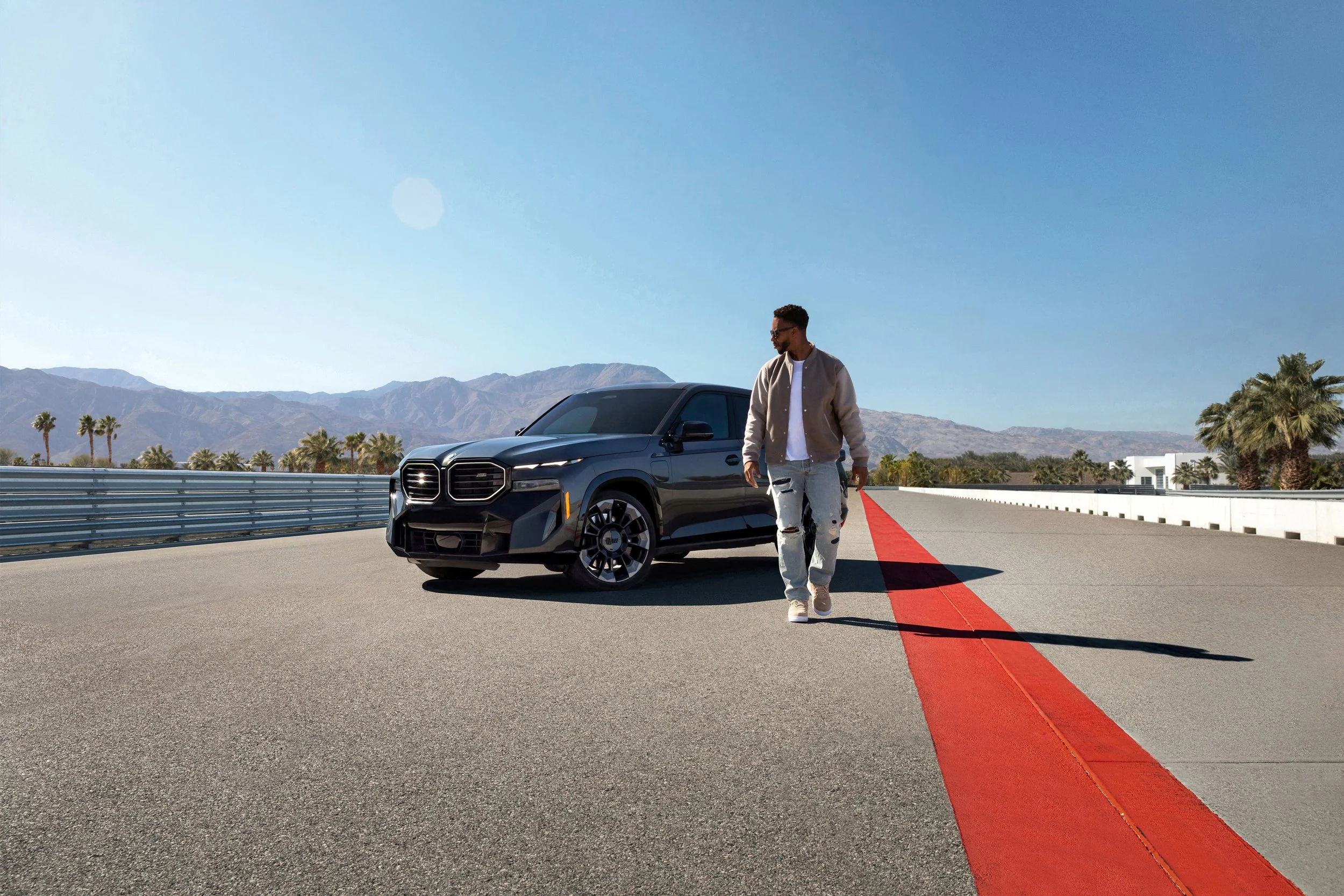 BMW XM automotive lifestyle campaign featuring Victor Cruz at BMW Performance Center West in California