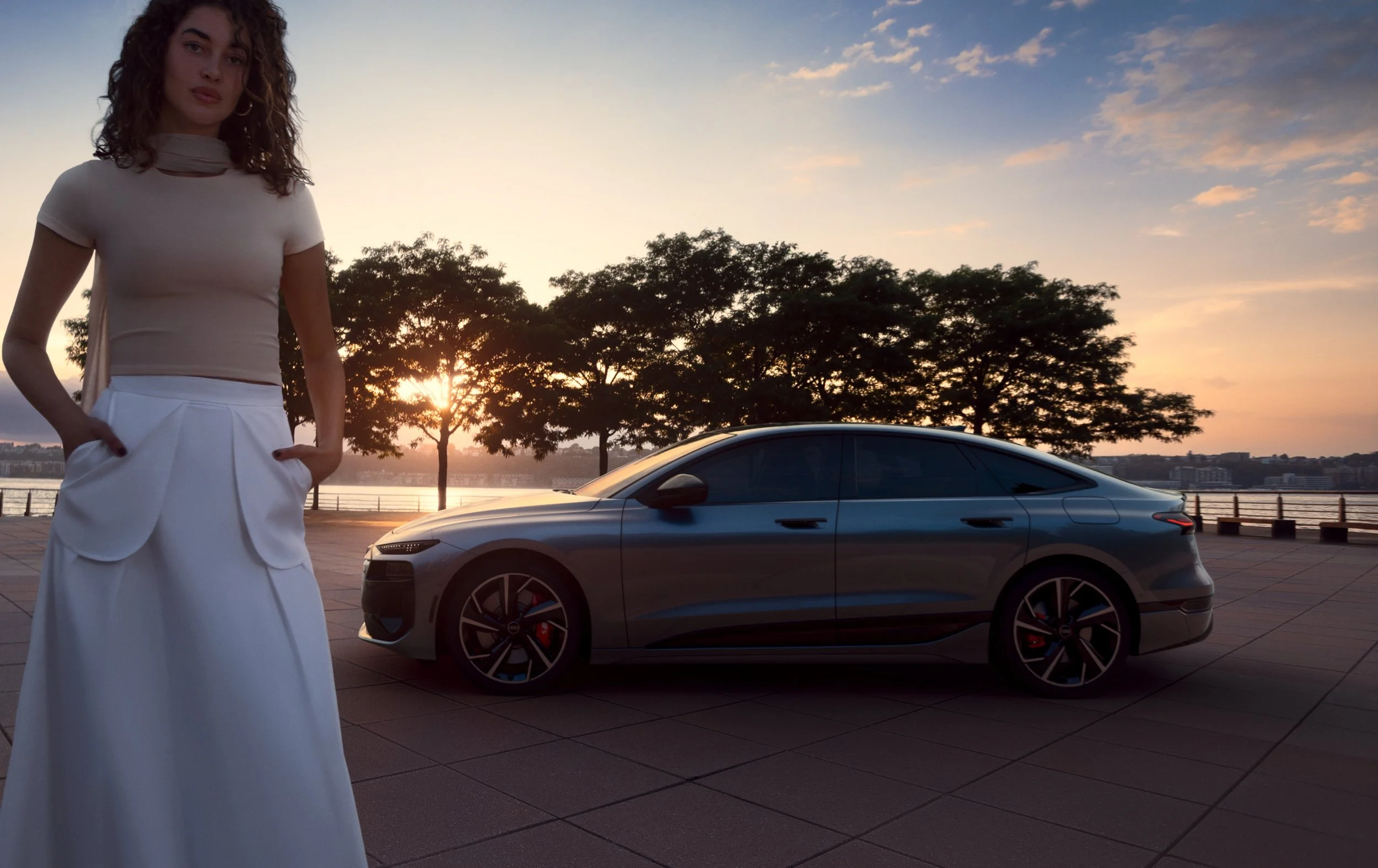 Audi e-tron side profile with female talent at sunset for an automotive CGI campaign
