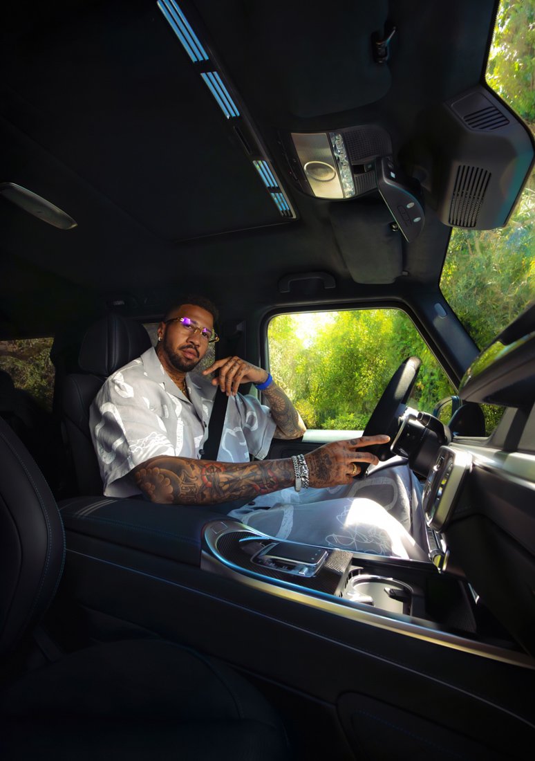 Celebrity athlete Miles Chamley-Watson featured in Mercedes-Benz commercial photography, blending automotive performance, lifestyle, and cinematic campaign styling.