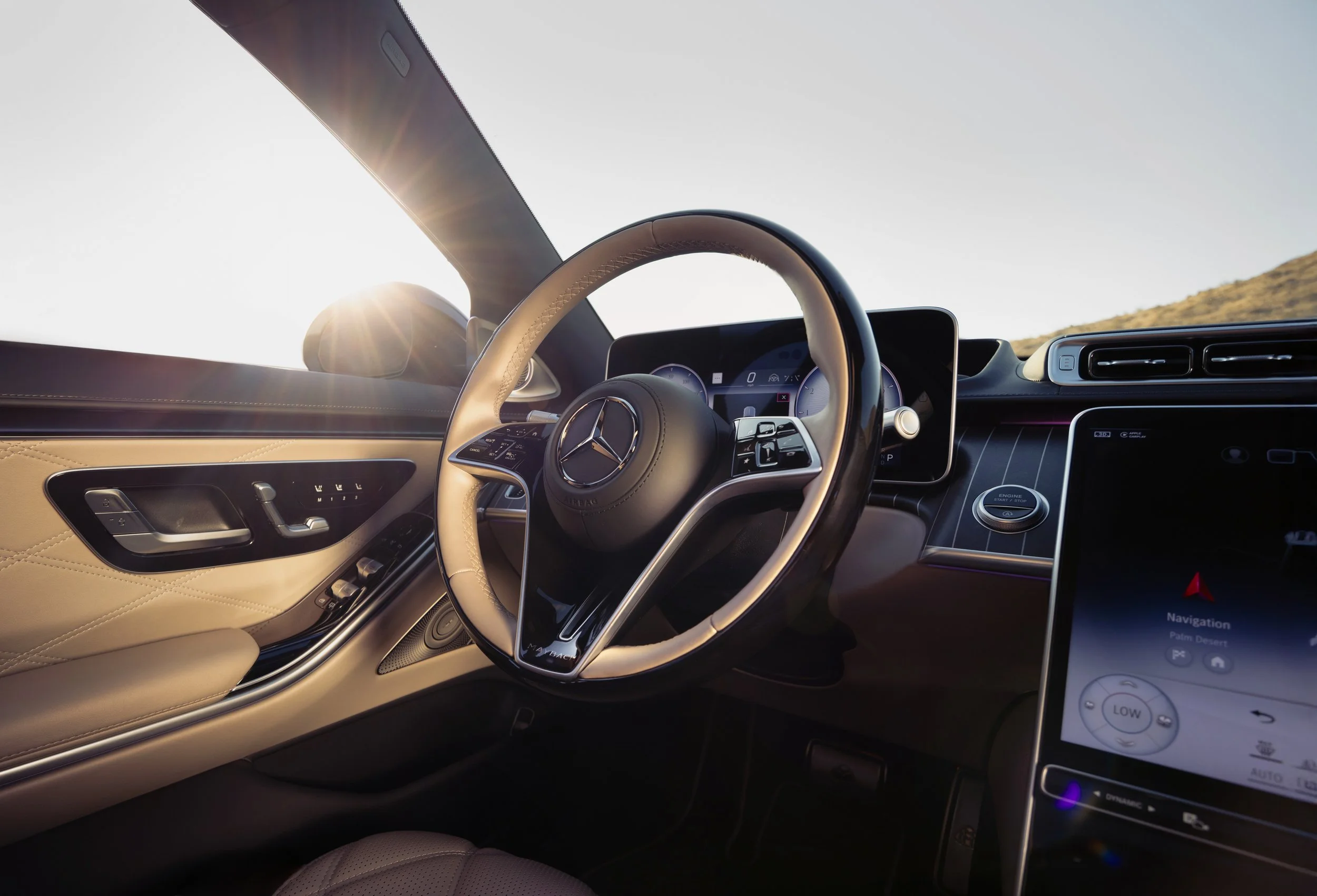 Mercedes-Maybach interior detail photography highlighting the steering wheel and luxury cockpit design